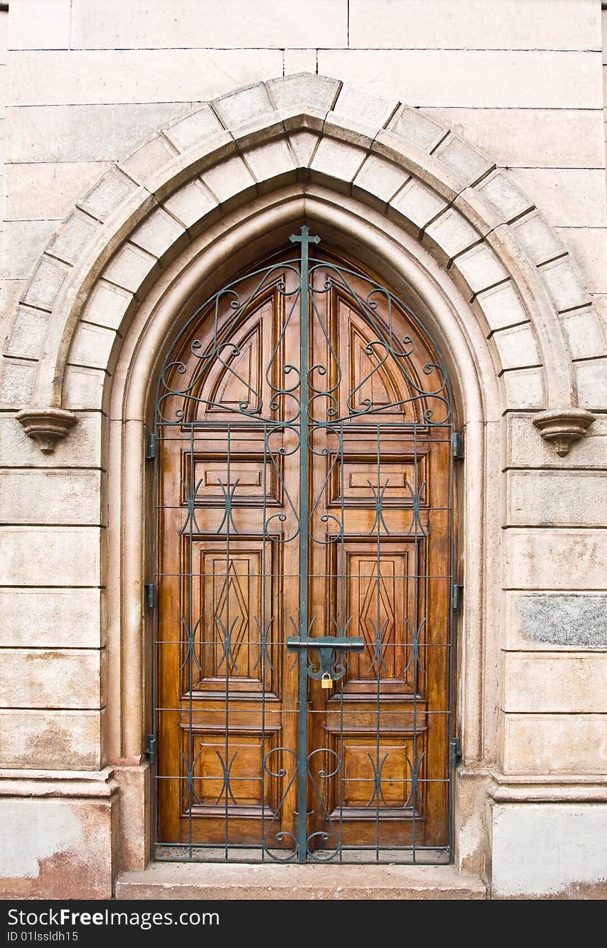 Old wooden door and stone brick wall