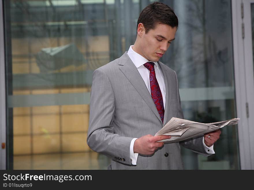 Man Reads Newspaper