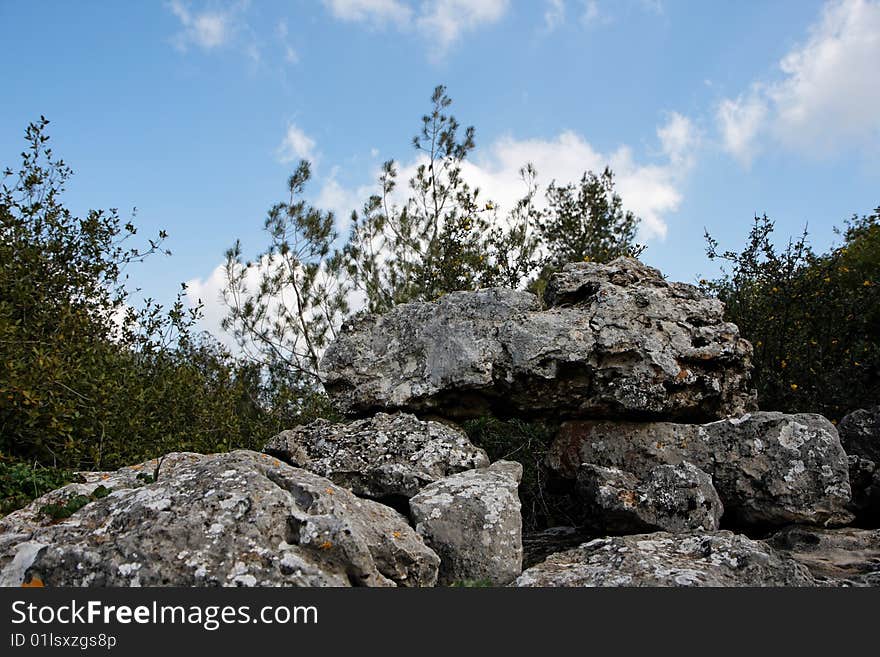 Pyramid Of Lichen-covered Gray Rocks