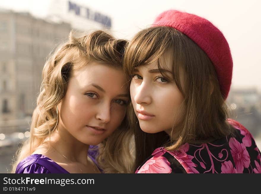 Blonde and brunette on a background Moscow