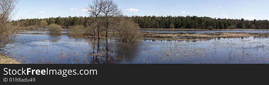 The panorama of river with clouds.