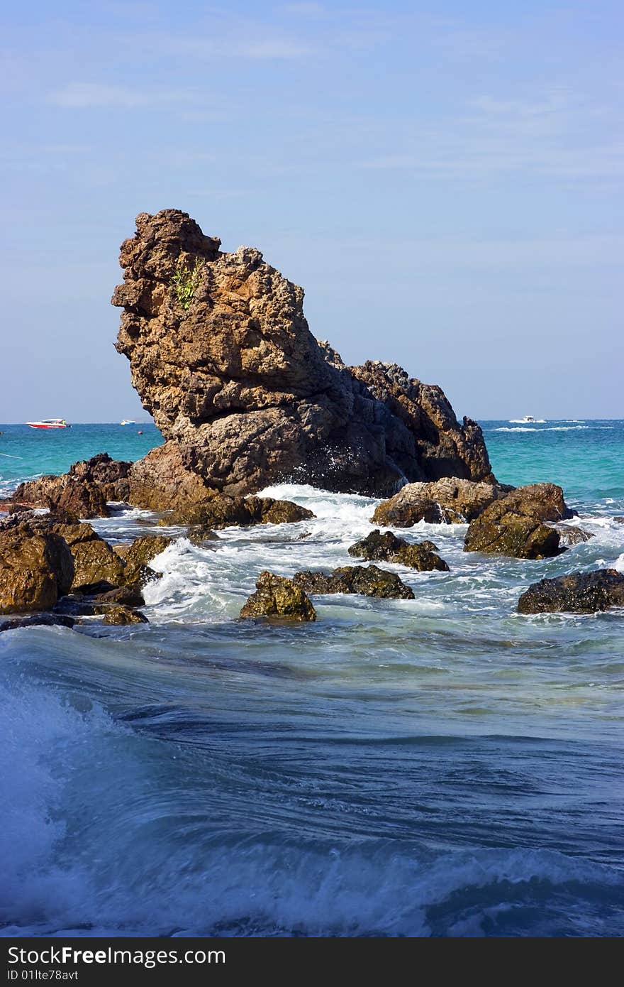 Rock Arch, Blue Ocean and Boat. Rock Arch, Blue Ocean and Boat