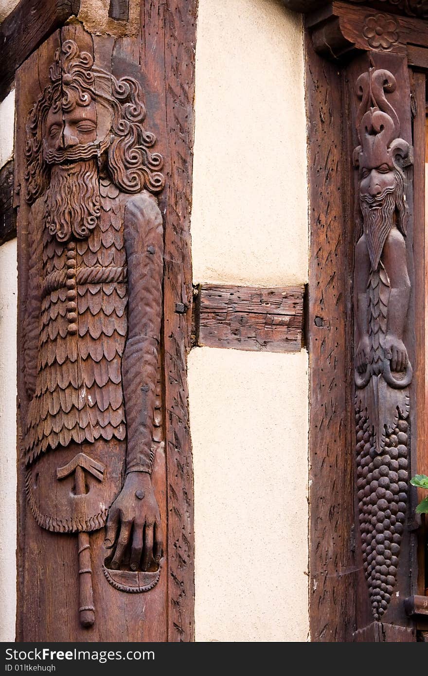 Detailed woodcarving on timber frame house in Alsace village, France, Alsace Vine Route. Detailed woodcarving on timber frame house in Alsace village, France, Alsace Vine Route