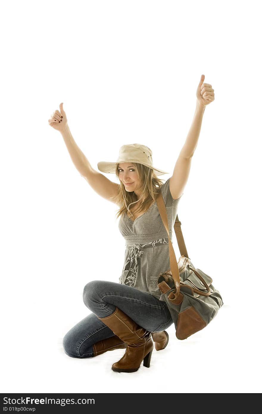 Happy woman going on vacation with passport and her suitcase over a white background