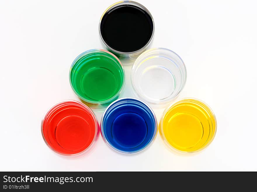 Glasses with colored water on white background. Glasses with colored water on white background