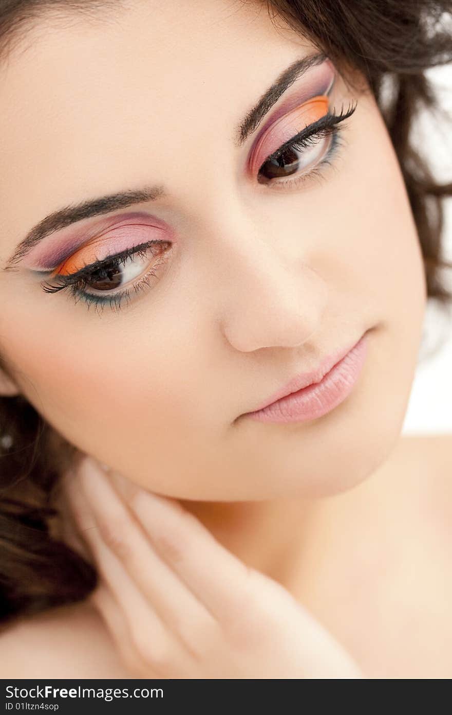 Closeup portrait of beautiful woman with colorful makeup. Closeup portrait of beautiful woman with colorful makeup