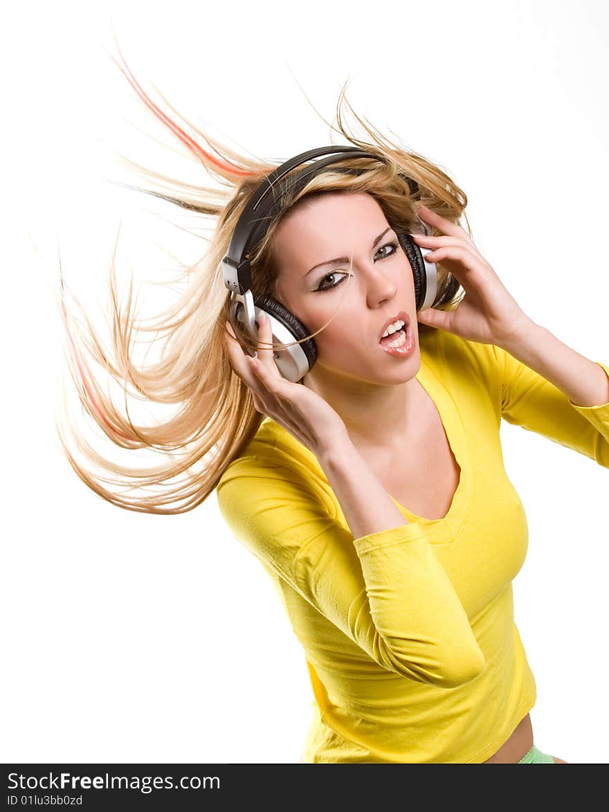 Beautiful blond girl with long hair and headphones. Beautiful blond girl with long hair and headphones