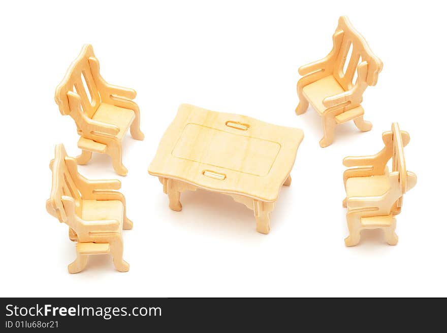 Wooden toy furniture on a white background