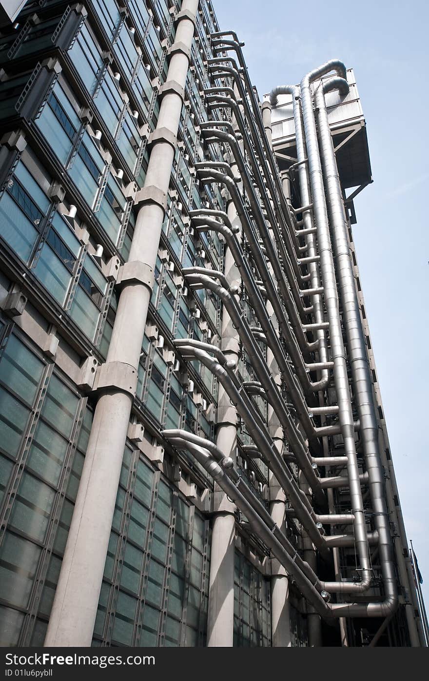 Photograph of a futuristic looking office building taken in central london. Photograph of a futuristic looking office building taken in central london.