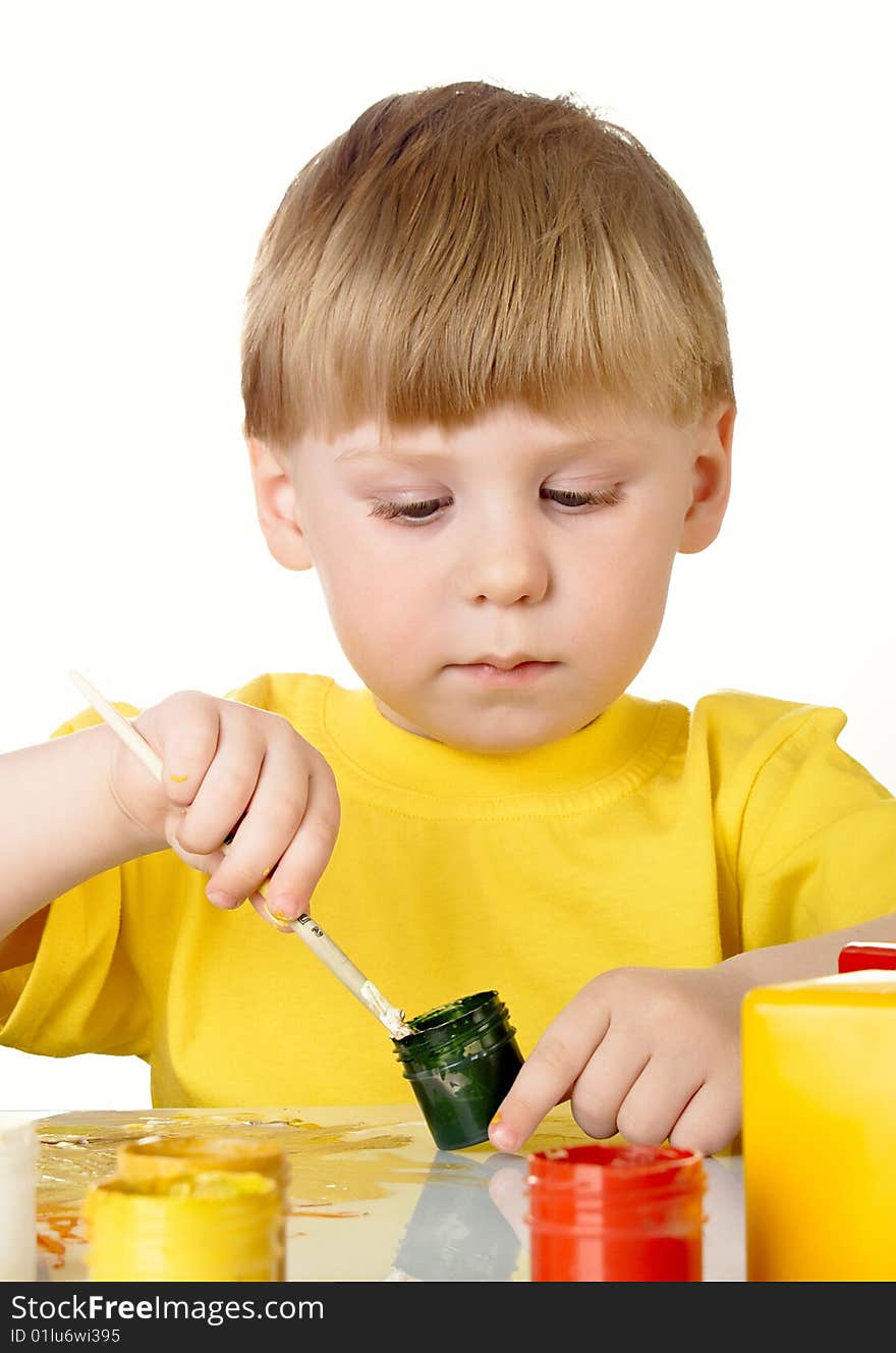 Child draws on the white background. Child draws on the white background