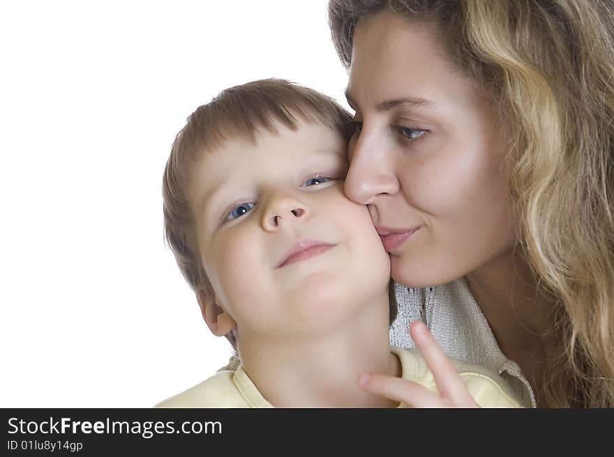 Portrait of a family. Mother kissing her son. Portrait of a family. Mother kissing her son.