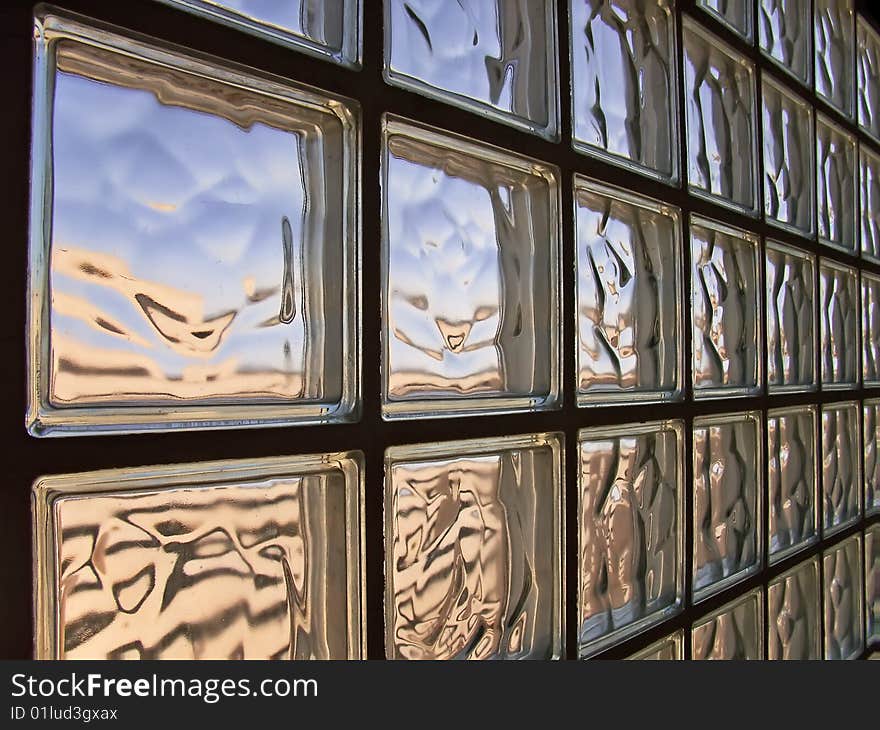 Wall made of glass bricks distorting light. Wall made of glass bricks distorting light