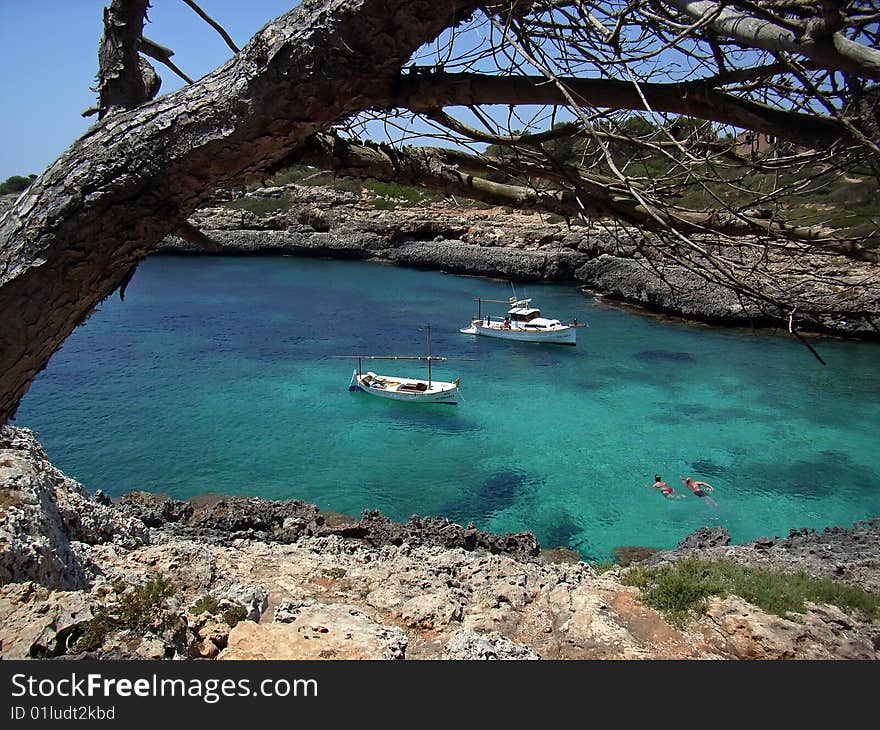 People swimming in the coast of Majorca (Spain). People swimming in the coast of Majorca (Spain)