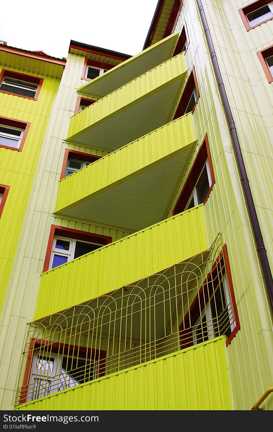 Modern building from a brick. Bright colour house