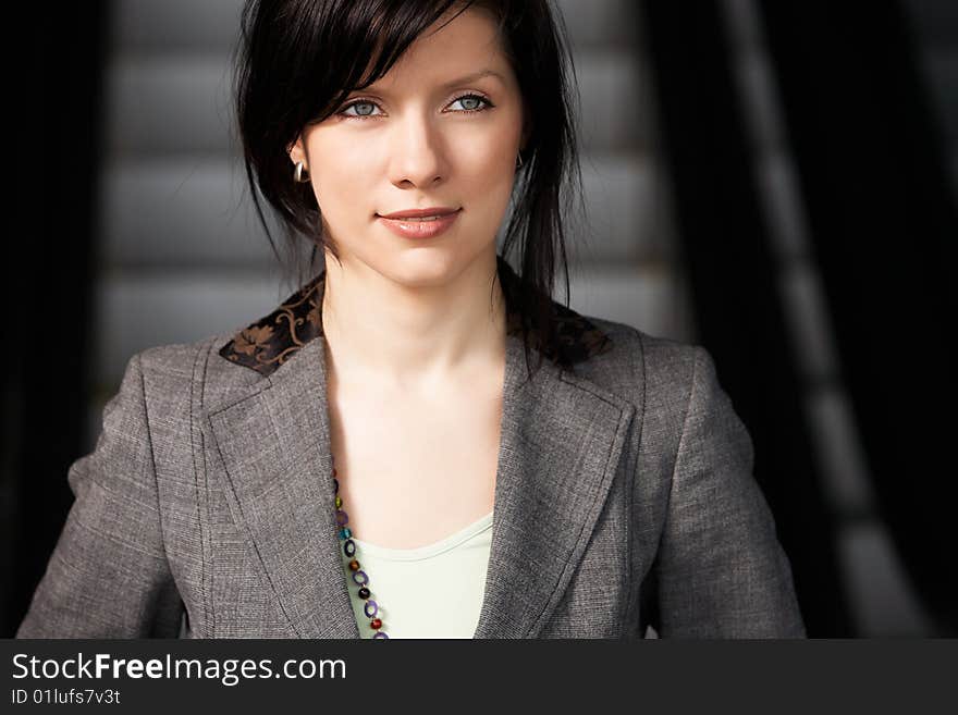 Young confident caucasian businesswoman in the working space. Young confident caucasian businesswoman in the working space