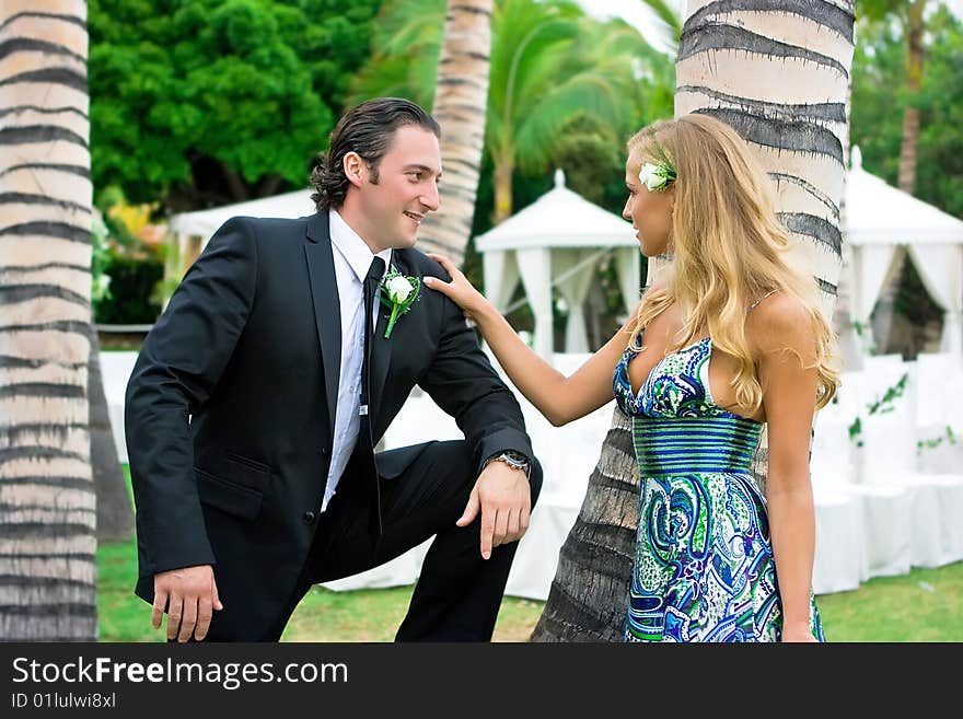 Happy wedding guests looking at each other. Happy wedding guests looking at each other