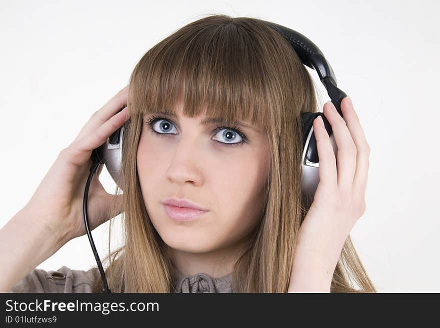 Pretty female model with headphones