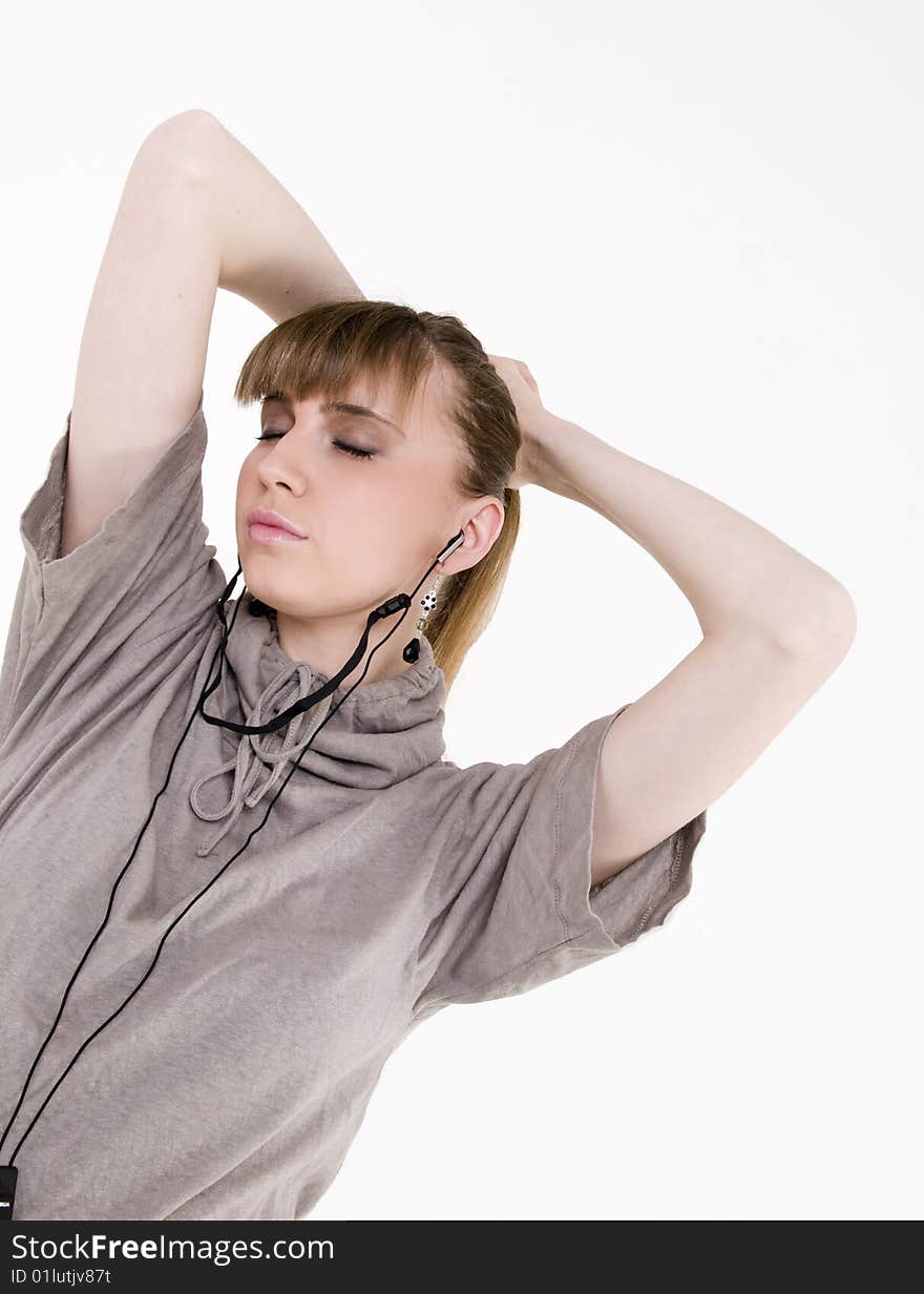 Pretty female model with headphones