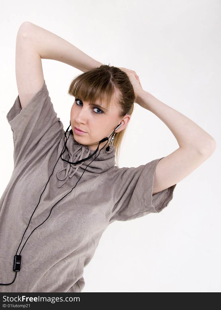 Pretty female model with headphones