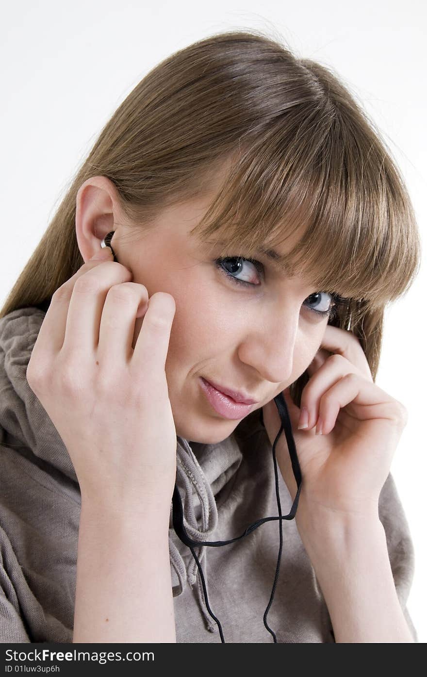 Pretty female model with headphones