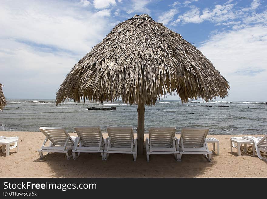 A cabana at a beach side resort. A cabana at a beach side resort