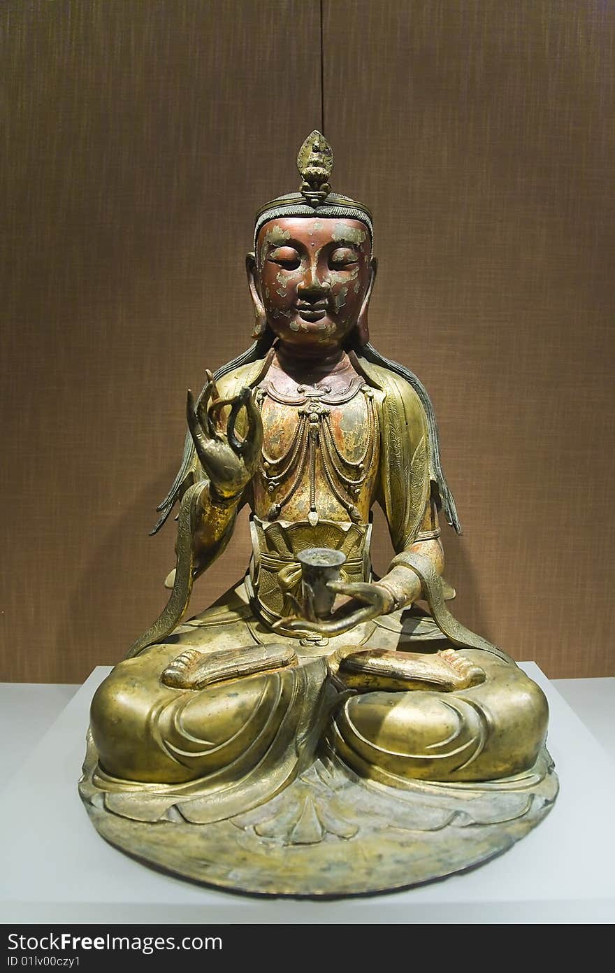 Golden copper buddha statue from china.