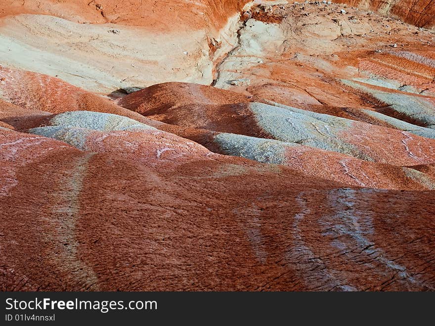 Cracked and dried red earth. Cracked and dried red earth