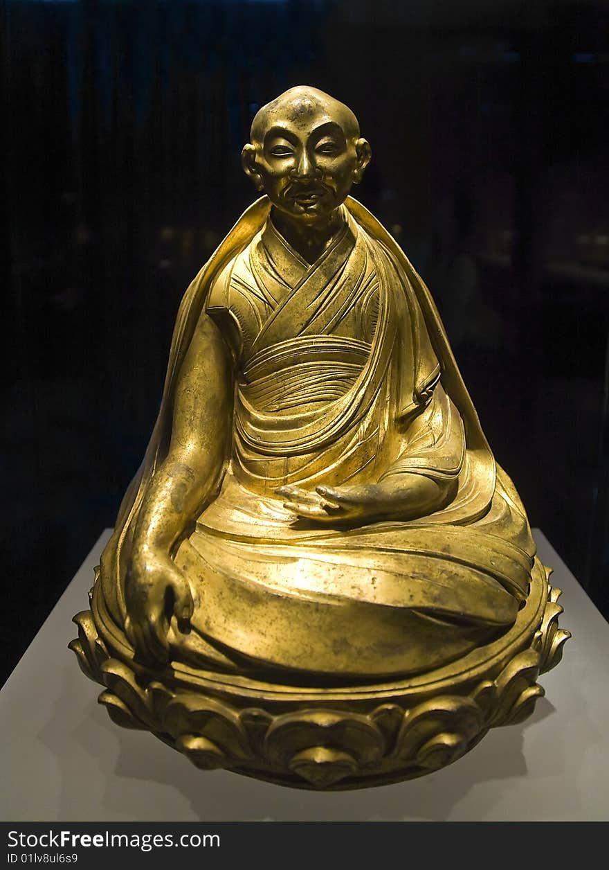 Golden copper buddha statue from china.