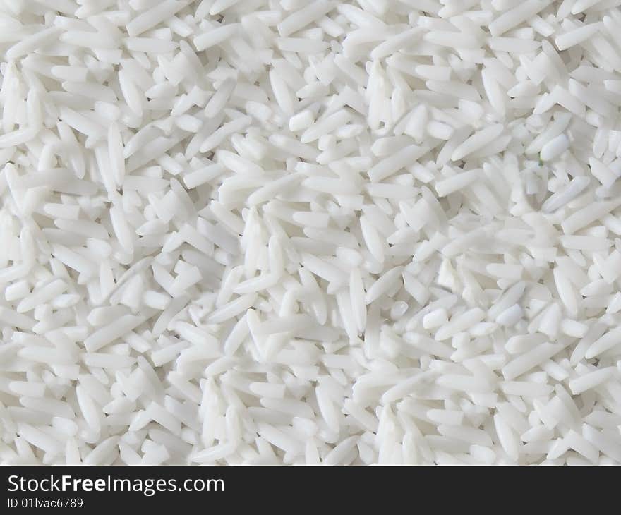 White rice granules texture background. White rice granules texture background