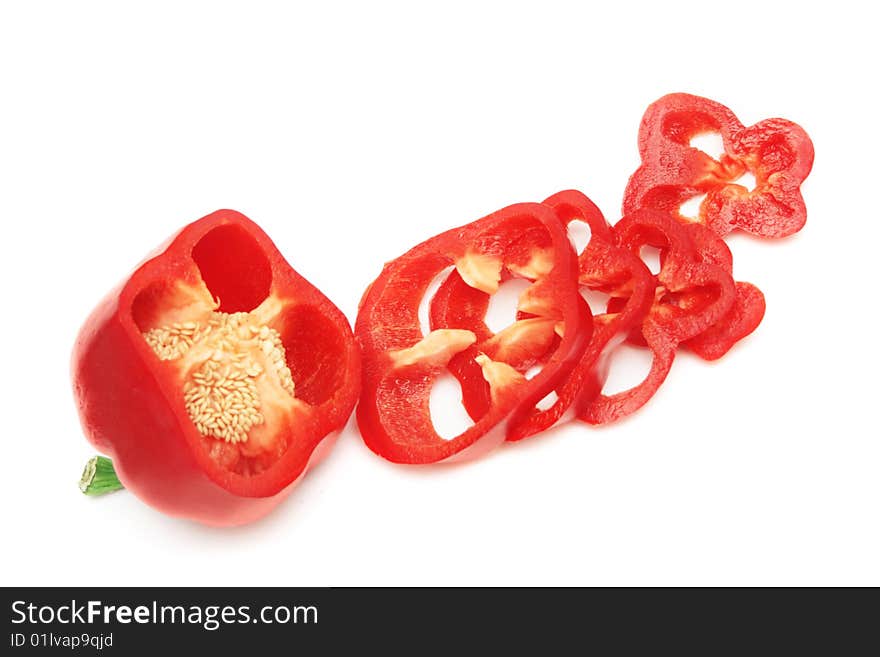 Sliced red sweet pepper isolated on white. Sliced red sweet pepper isolated on white.