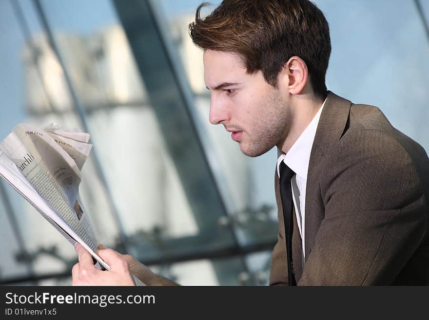 Man looks with newspaper,  man looks seriously with newspaper,. Man looks with newspaper,  man looks seriously with newspaper,