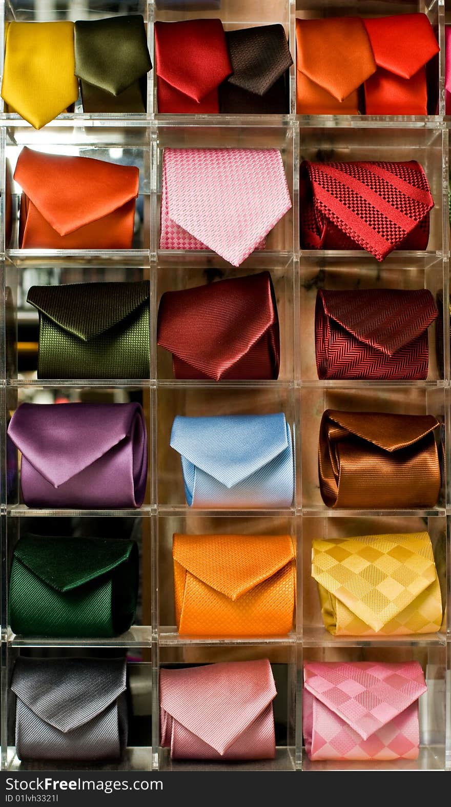 Shelf full of fine silk neckties in a Italian textile store. Shelf full of fine silk neckties in a Italian textile store