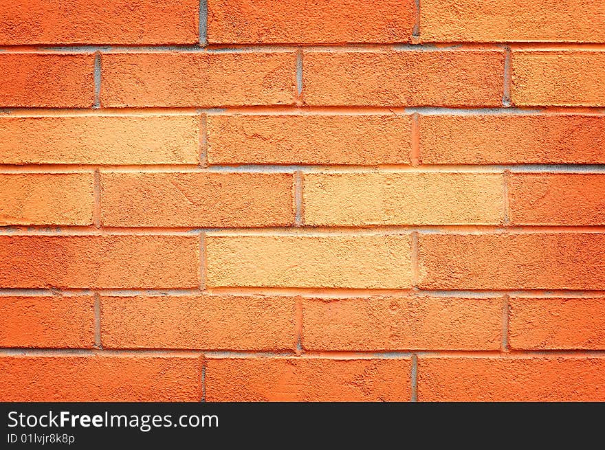 Orange bricks in the wall. Can be used as background