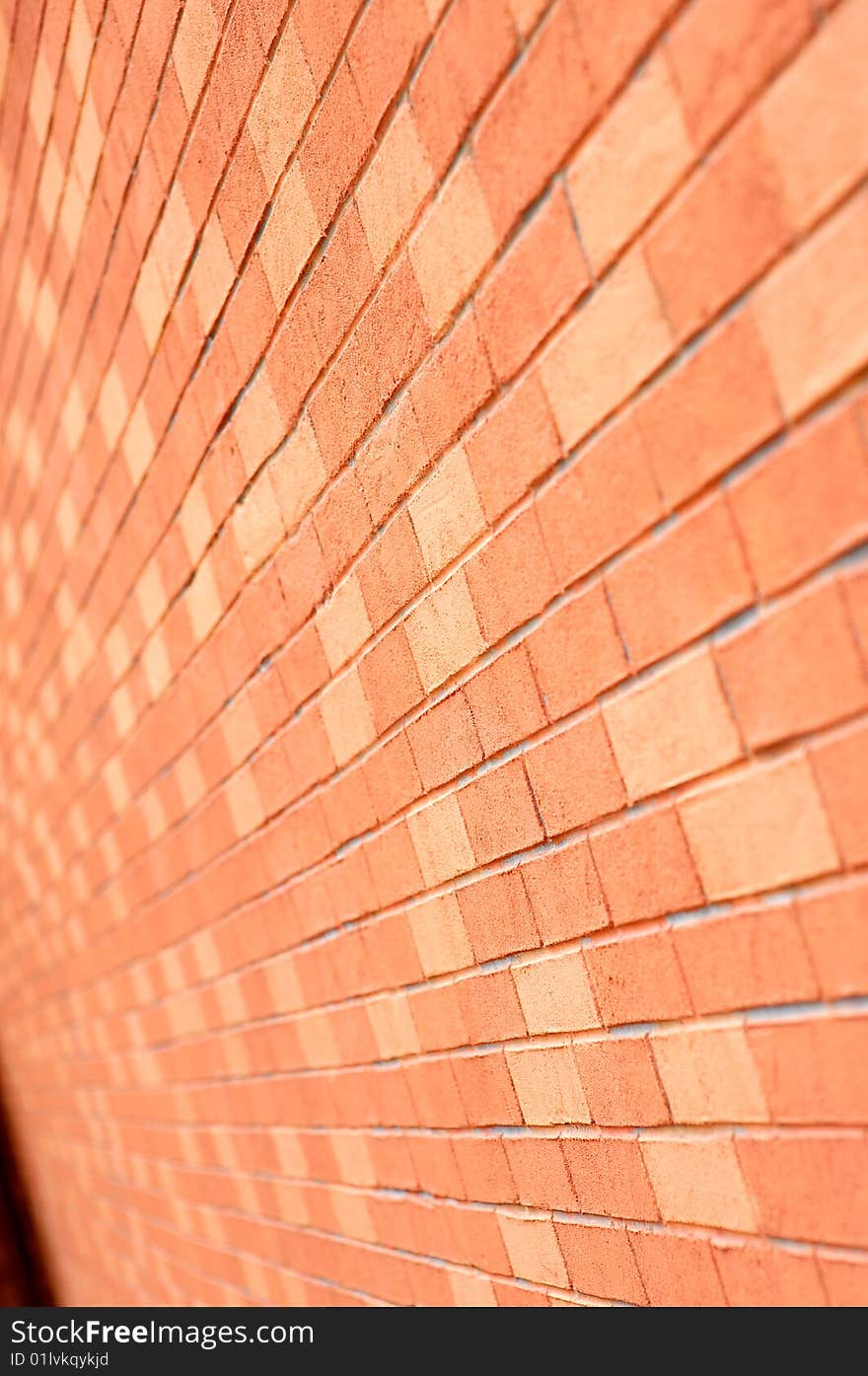 Orange bricks in the wall can be used as background