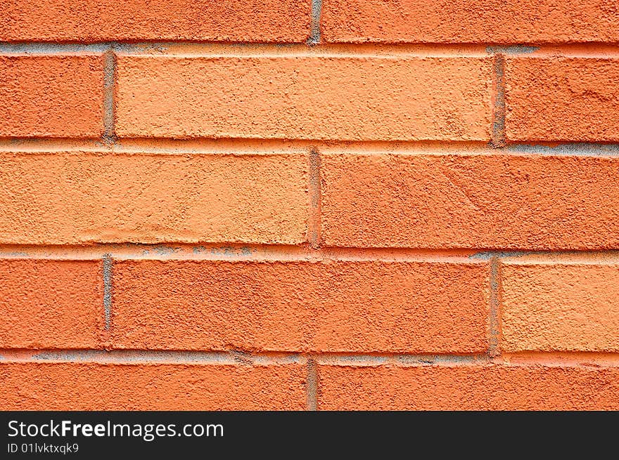 Orange bricks in the wall can be used as background