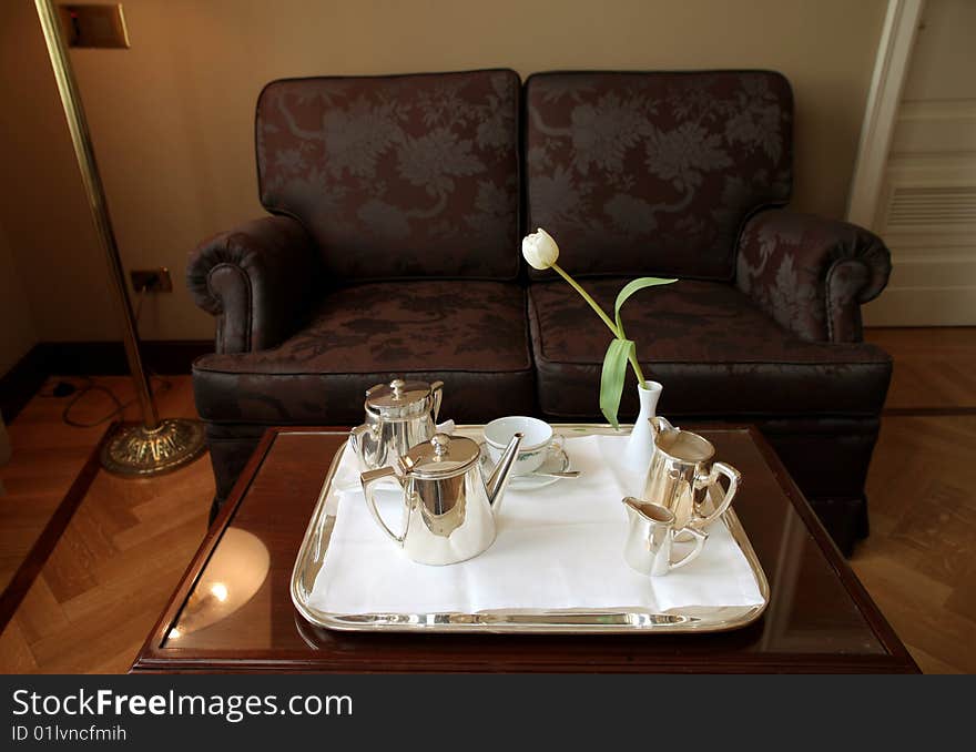 Silver tea set and a flower. Silver tea set and a flower