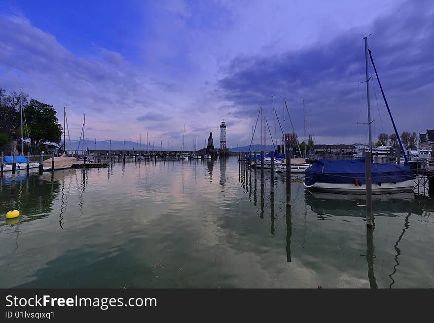 View of the famous harbour of Lindau, bavarian Town at Lake Constance, Germany, near Austria and Switzerland. View of the famous harbour of Lindau, bavarian Town at Lake Constance, Germany, near Austria and Switzerland