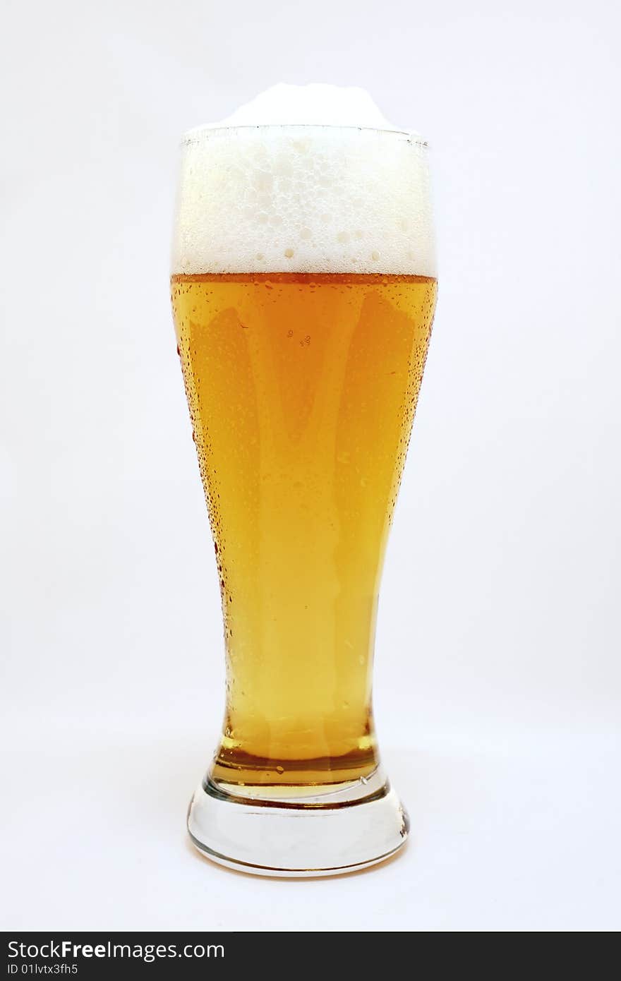 Glass of wheat beer isolated. Glass of wheat beer isolated