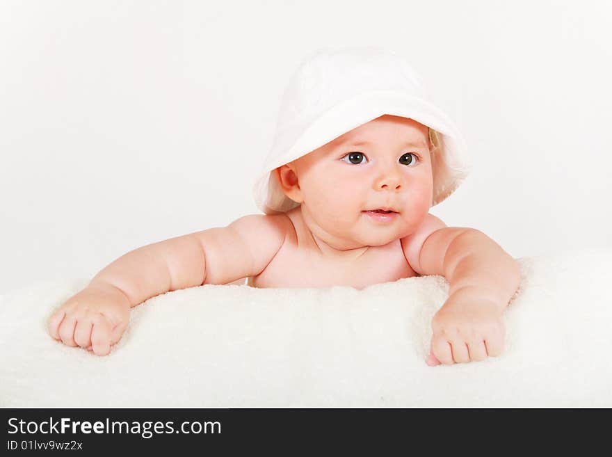 Little baby in a hat after bathing. Little baby in a hat after bathing