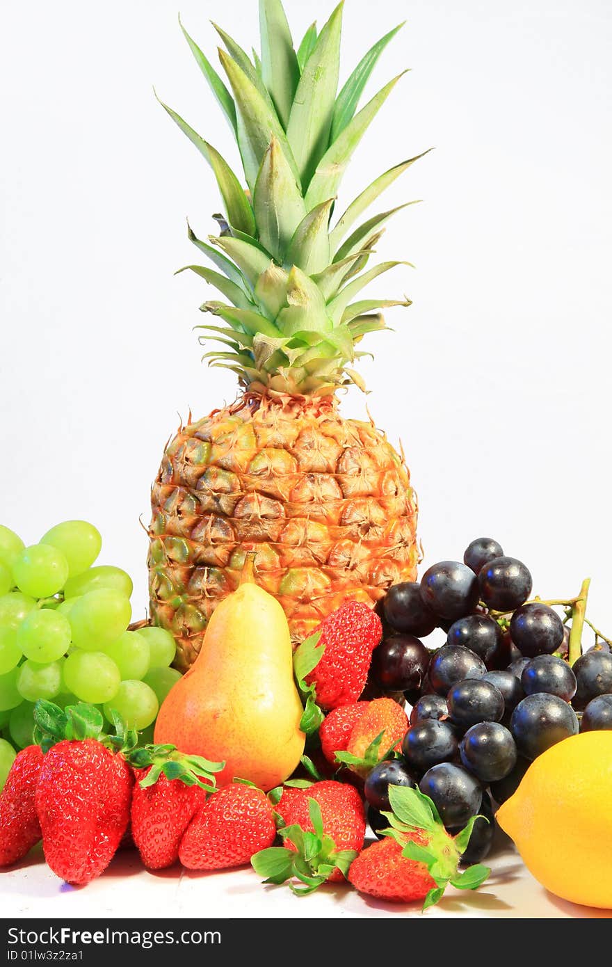 A photo of fruits on white ground