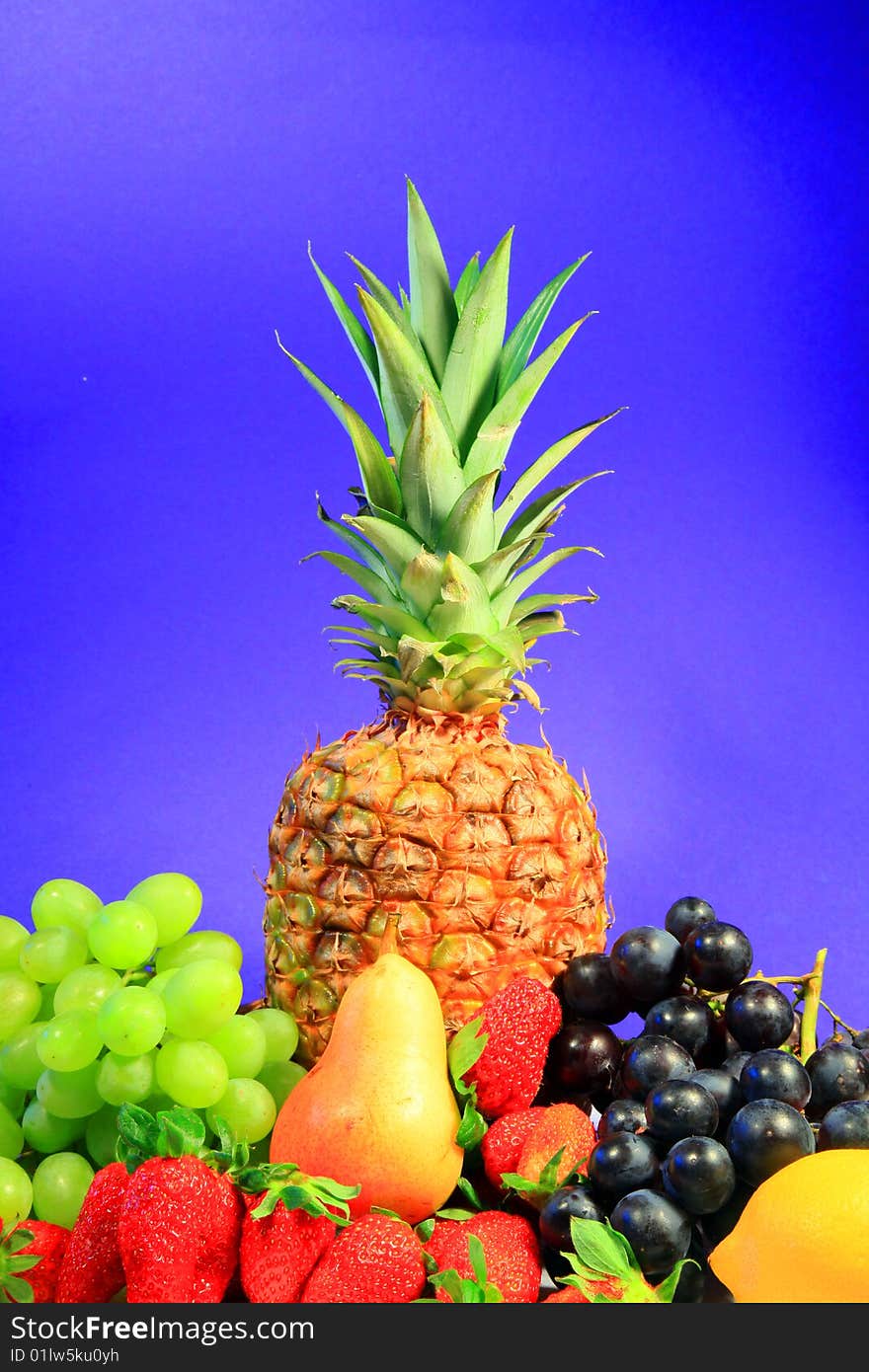 A photo of fruits on white ground