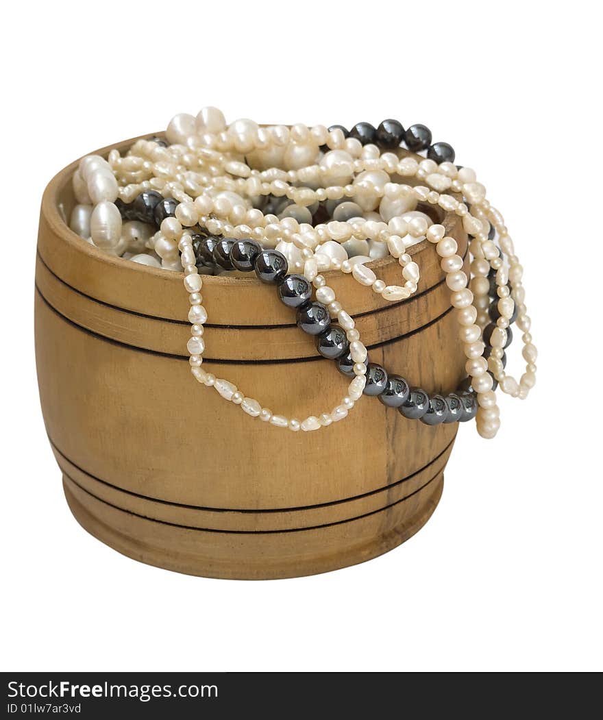 Chest with pearls. Wooden chest and necklace isolated on white background.