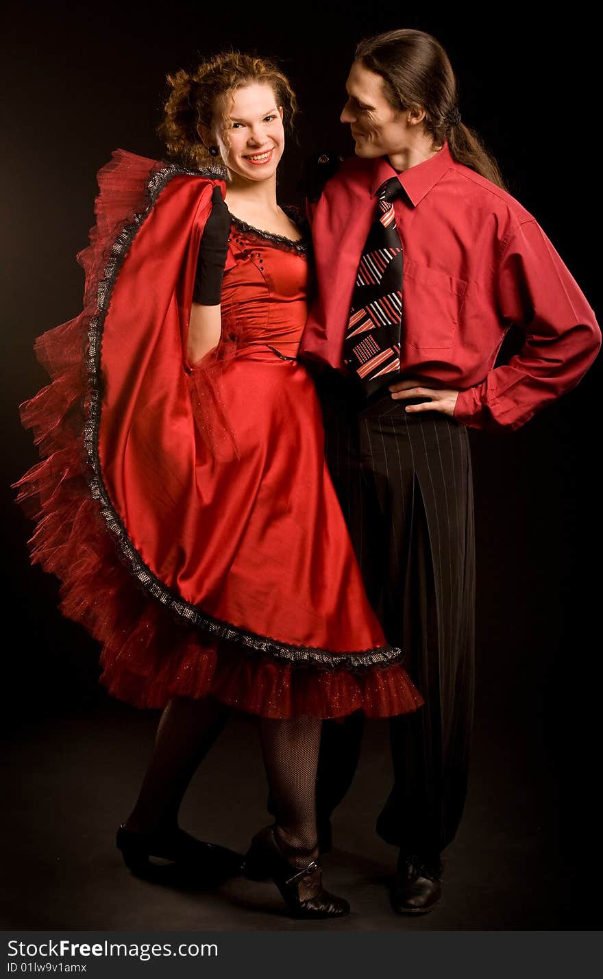 Couple in red dance costumes