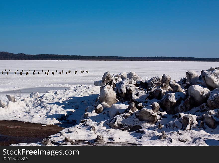 Winter lake and blue sky