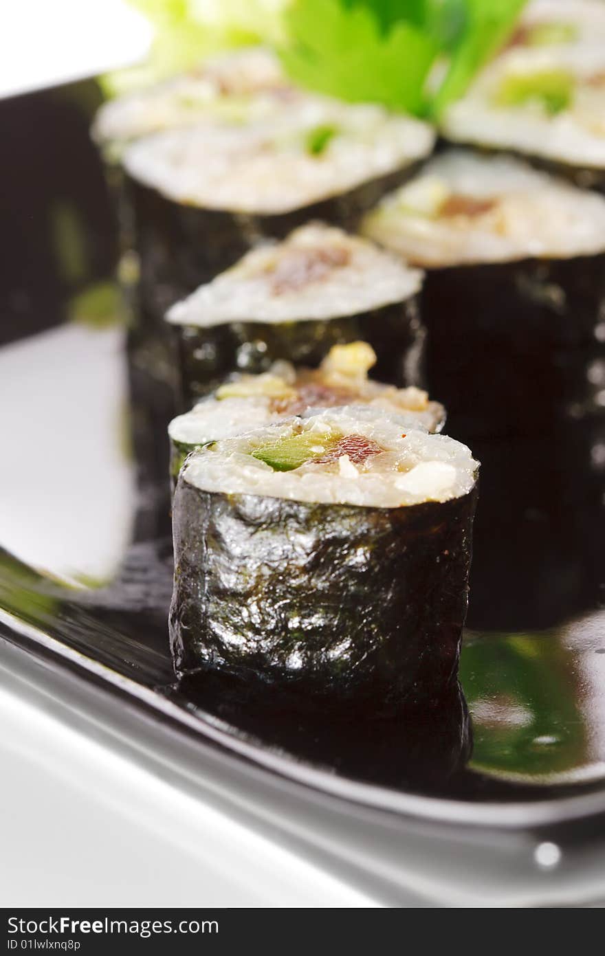 Japanese Cuisine - Sushi with Salad Leaf and Parsley