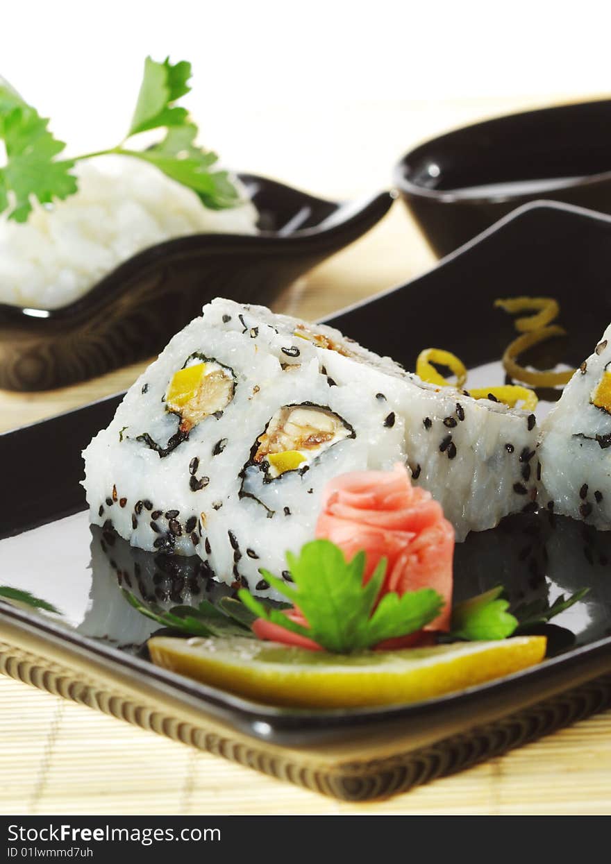 Japanese Cuisine - Sushi with Salad Leaf and Parsley