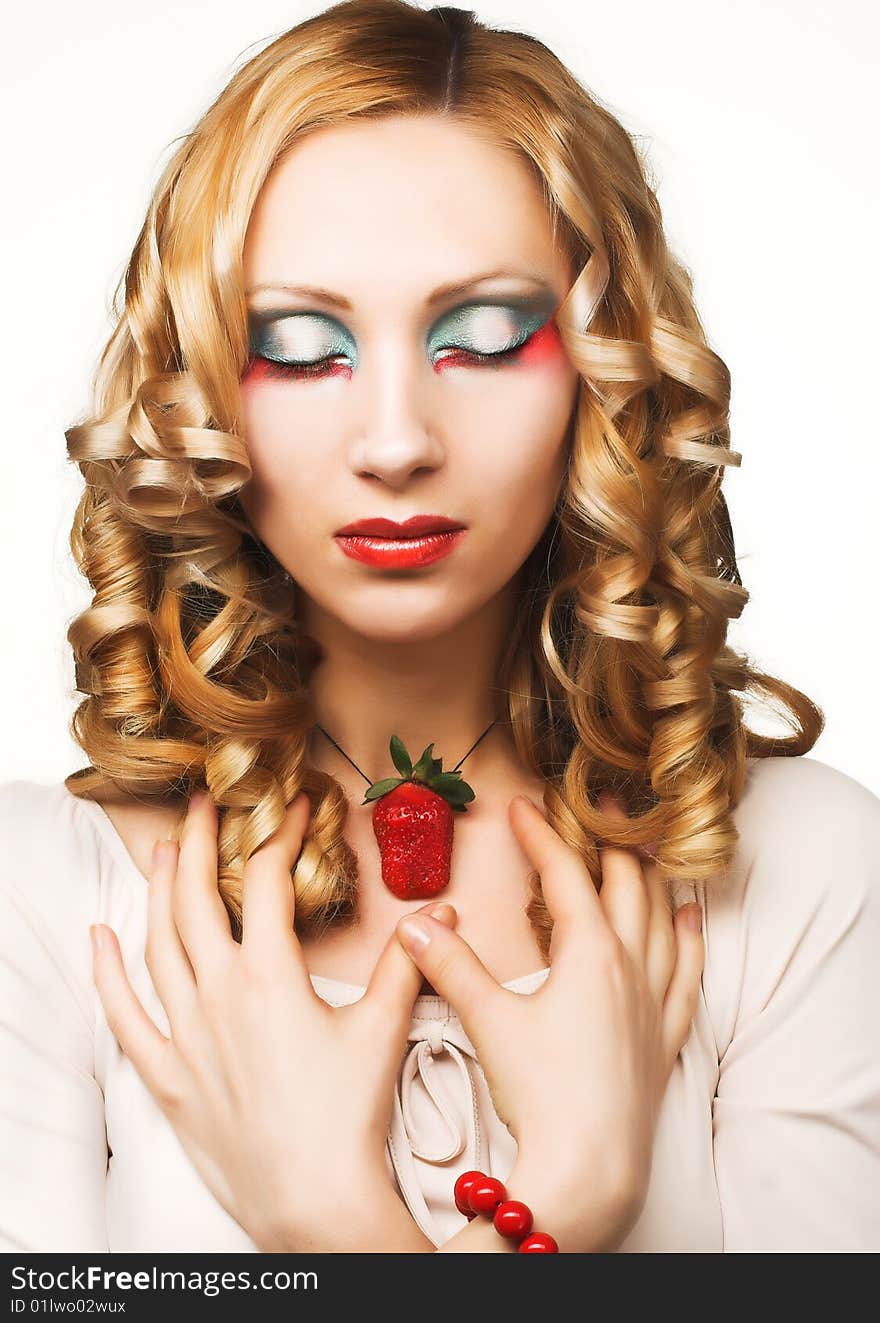 Portrait of pretty blonde with fresh strawberry. Portrait of pretty blonde with fresh strawberry