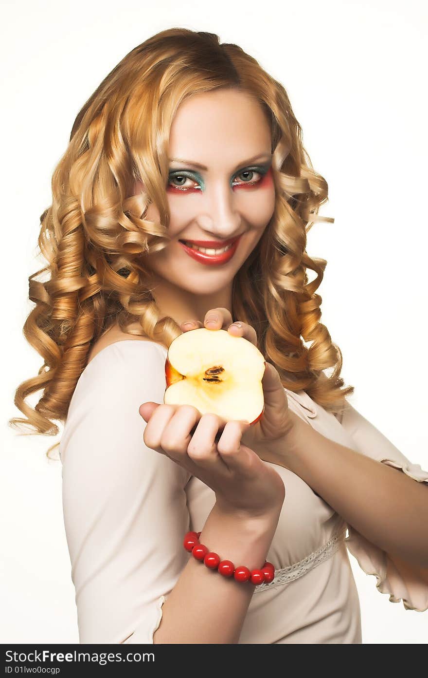 Portrait of pretty blonde with red apple. Portrait of pretty blonde with red apple