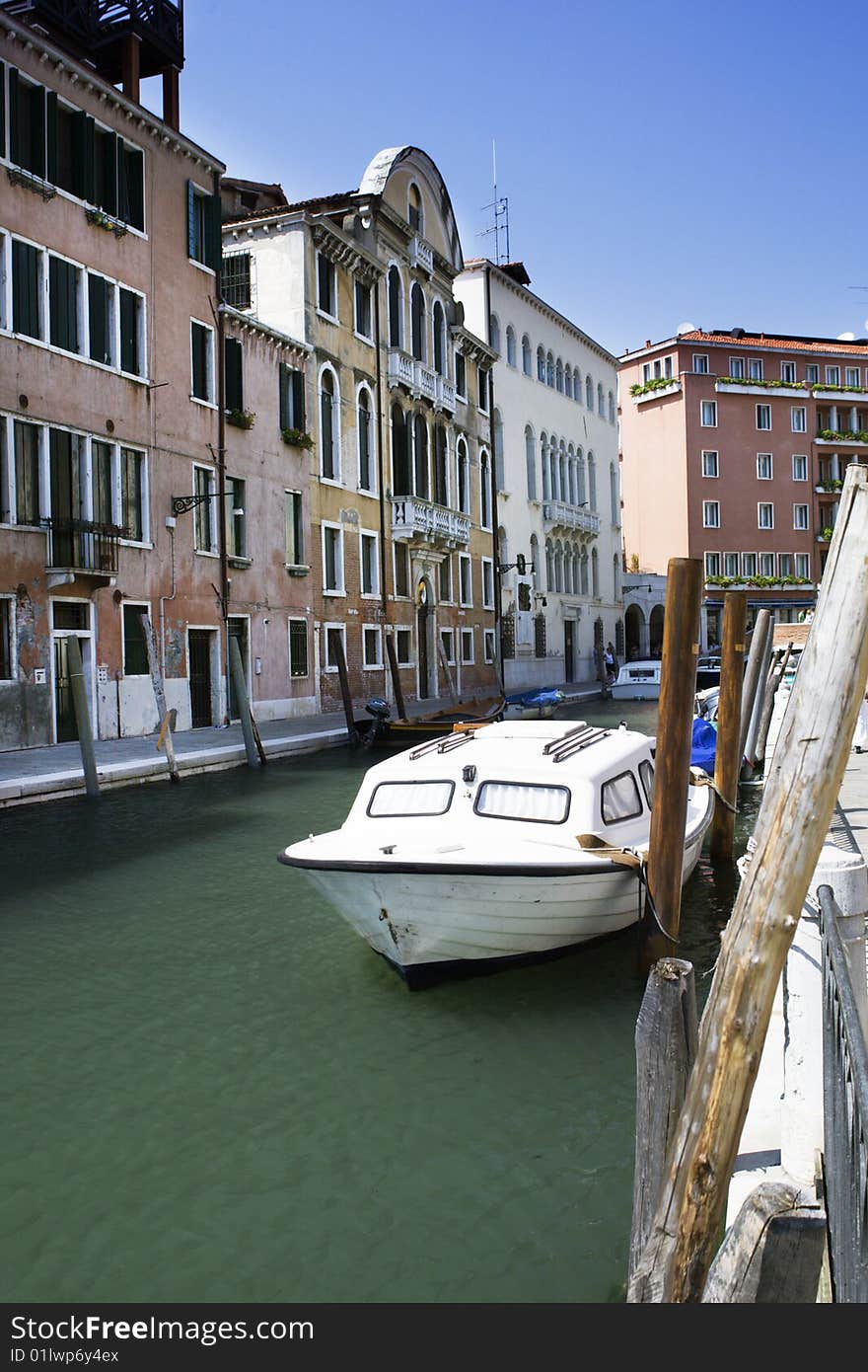 Venice channel with bridge and boats in the summer. Venice channel with bridge and boats in the summer