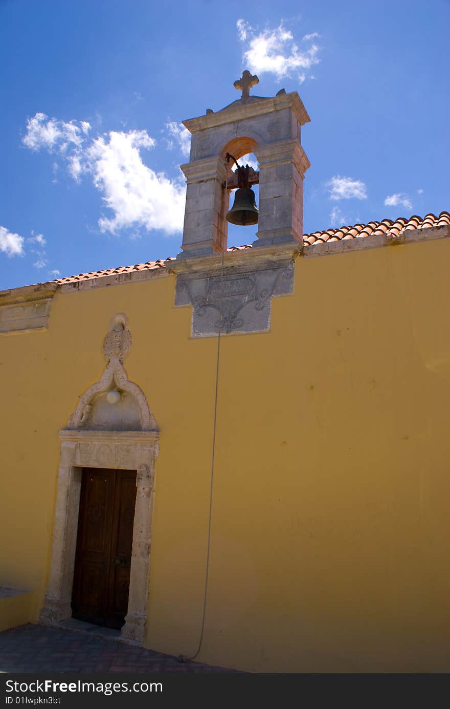 Door and bell of Church in Crete. Door and bell of Church in Crete